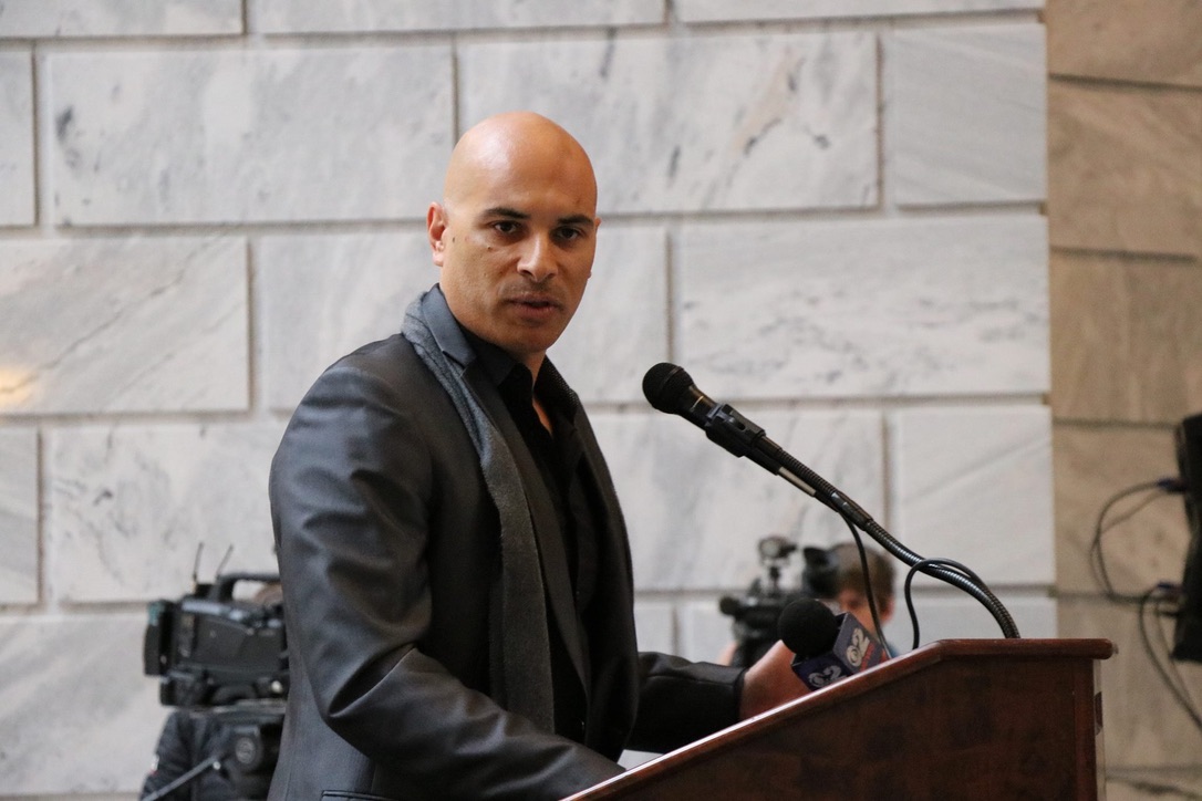 Bassam Salem speaking at a naturalization ceremony at the Utah State Capitol